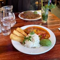 Cazuela de mariscos with rice, avocado and fried cassava